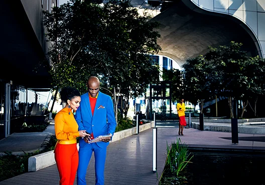 Employees look at a brochure of the extra benefit options by their employer. 