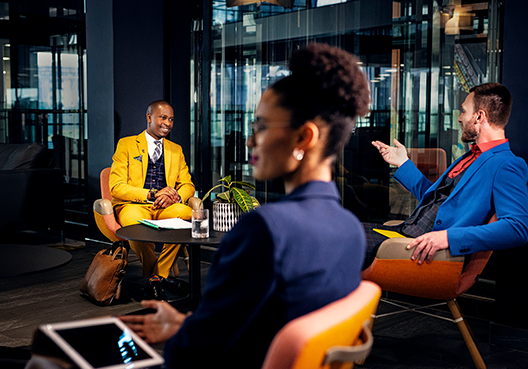 A group of professionals around a boardroom table