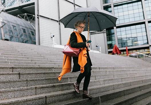 Woman walking down stairs