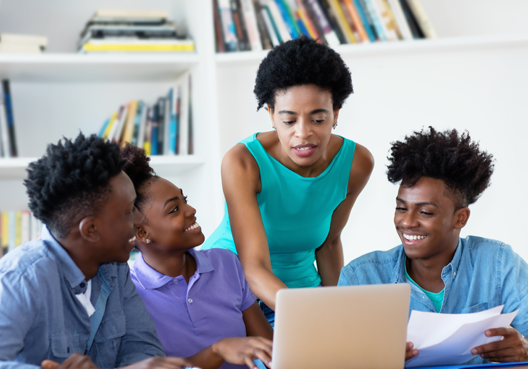 Three teenage learners get an introduction to the Old Mutual Learn.Think.Do programme.