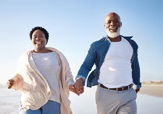 A South African couple relax outdoors after finishing their yearly estate planning review.