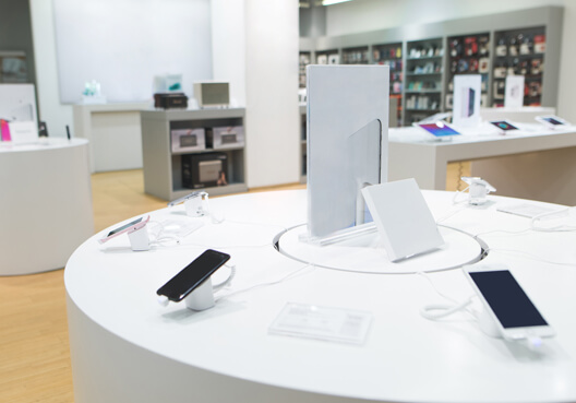 A retail store selling mobile devices like cellphones, tablets, and accessories. 