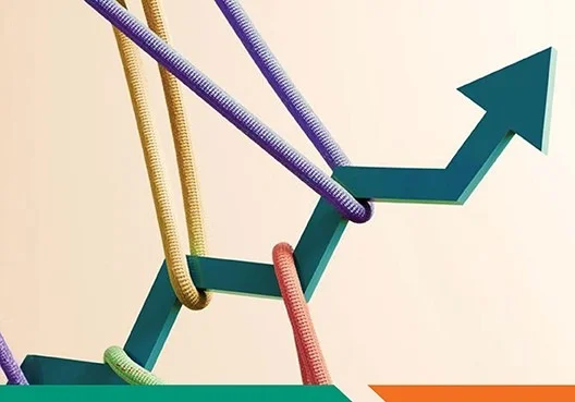 two colleagues having a conversation at the reception desk