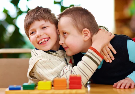 Two South African children enjoy playtime together.