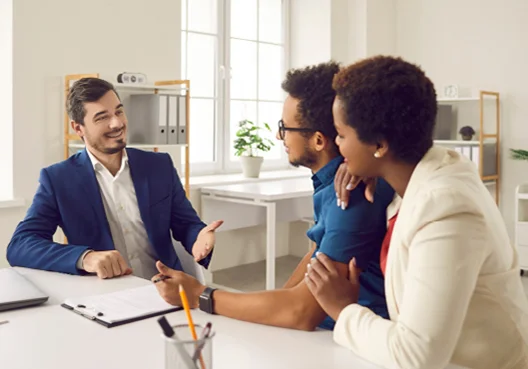 A Corporate Property insurance specialist talks to clients about the products on offer. 