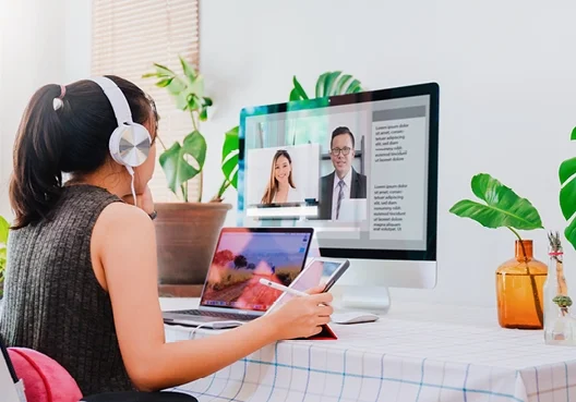 A South African woman discusses her financial situation and goals with an accredited Financial Adviser.