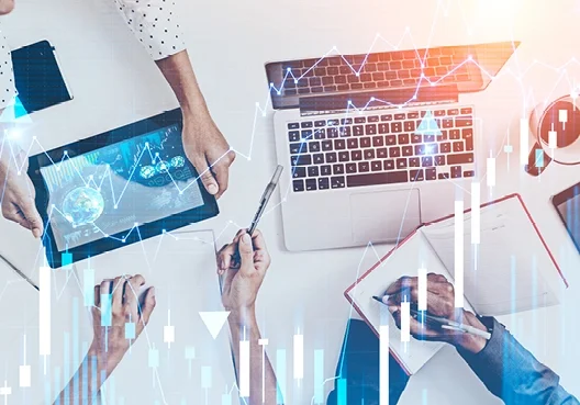 A client listens to the financial plan presented by a Financial Adviser as part of the financial coaching process.