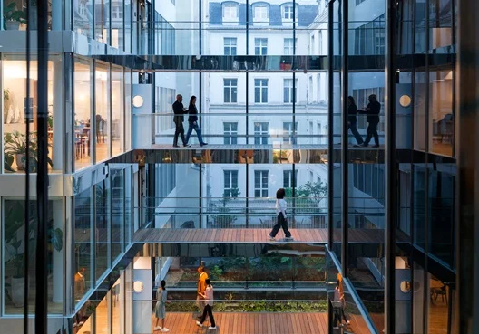 colleagues seated in an office foyer