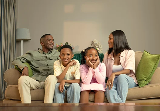 Family Relaxing at Home with a Secure Future in Place